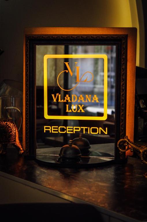a sign for a vadana los reception at Vladana DELUXE App 2 in Kruševac