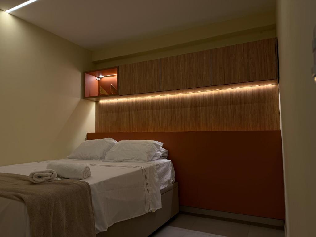 Ένα ή περισσότερα κρεβάτια σε δωμάτιο στο Flat Tamandaré em frente as piscinas naturais - Mila Rooftop