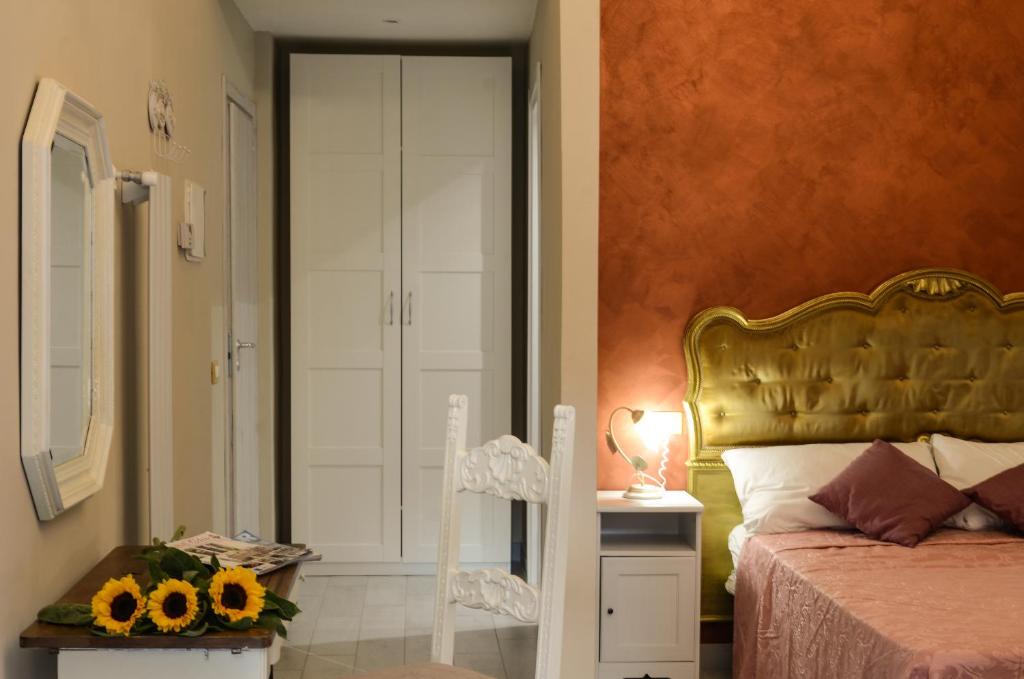 Een bed of bedden in een kamer bij Casa Scola Loano