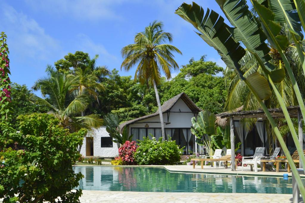 a view of a resort with a swimming pool at Coral De Fuego Isla Fuerte in Puerto Limón