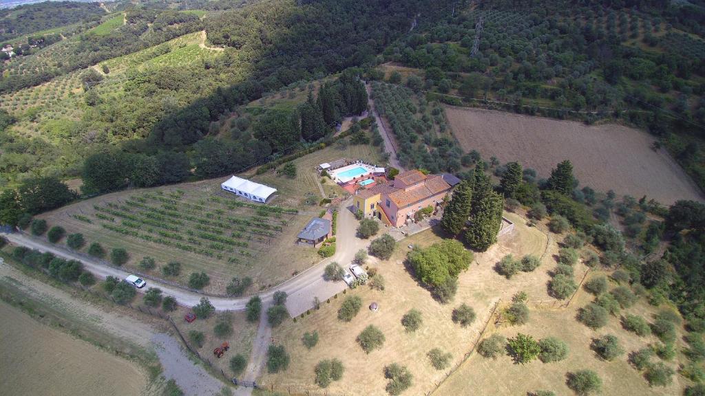 an aerial view of a house on a farm next to a river at Agriturismo Ai Mandrioli in Lastra a Signa