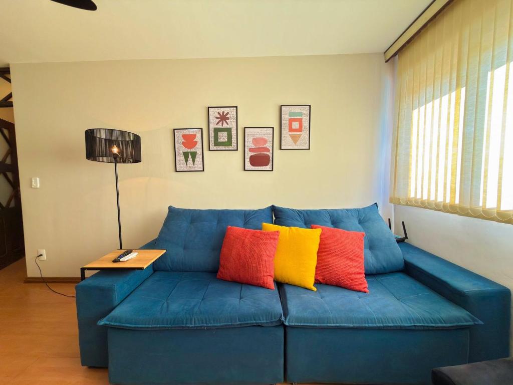 Un lugar para sentarse en Ap Praça Central - Wi-fi, Piscina, Garagem