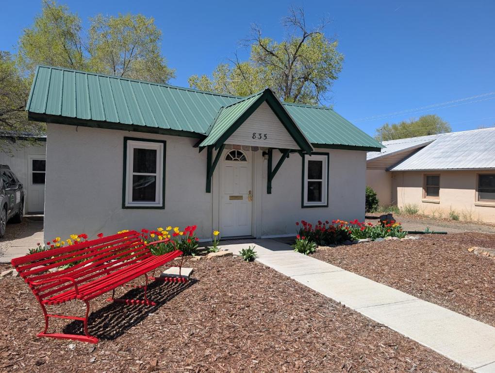 a small house with a red bench in front of it at AG House, Recreaters,Work Remote, Surgery, Healing ADA, Pets, Parking in Montrose