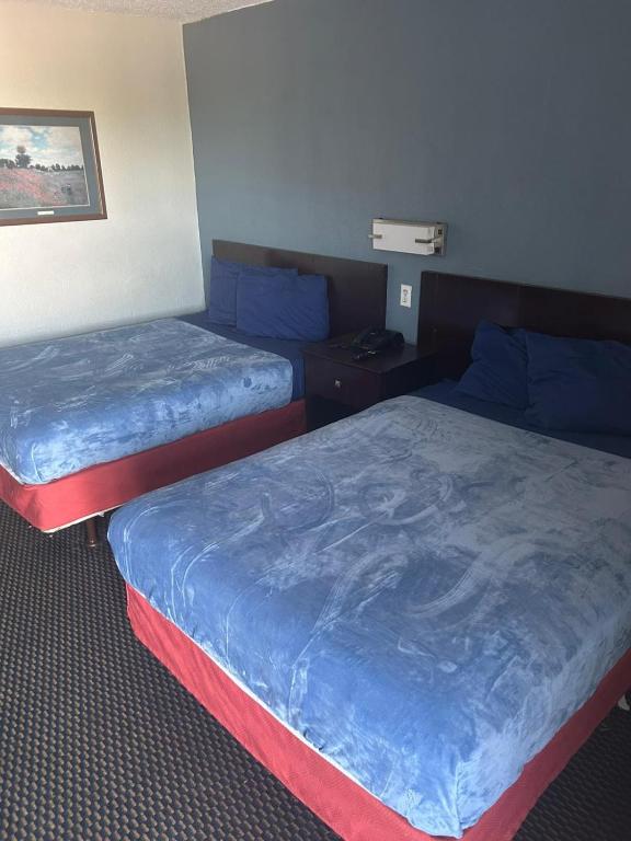 Ένα ή περισσότερα κρεβάτια σε δωμάτιο στο Double Bed Hotel Room 305