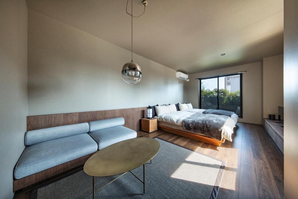 Ένα ή περισσότερα κρεβάτια σε δωμάτιο στο TERRACE tokaichi stay