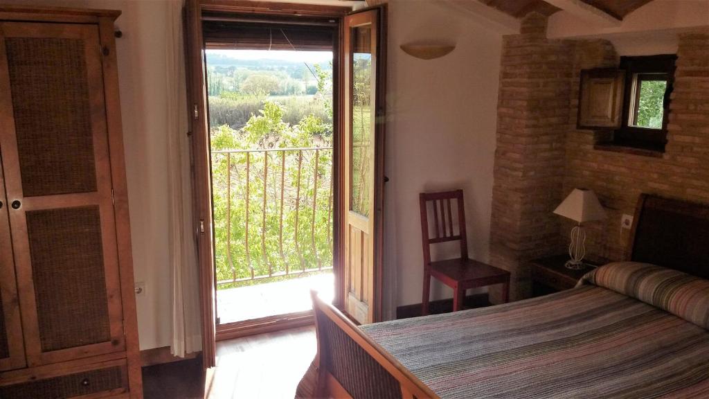 Postel nebo postele na pokoji v ubytování Casa del Rio