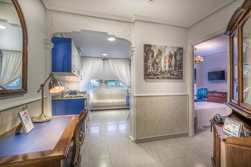 Postel nebo postele na pokoji v ubytování Apartamentos Las Brisas