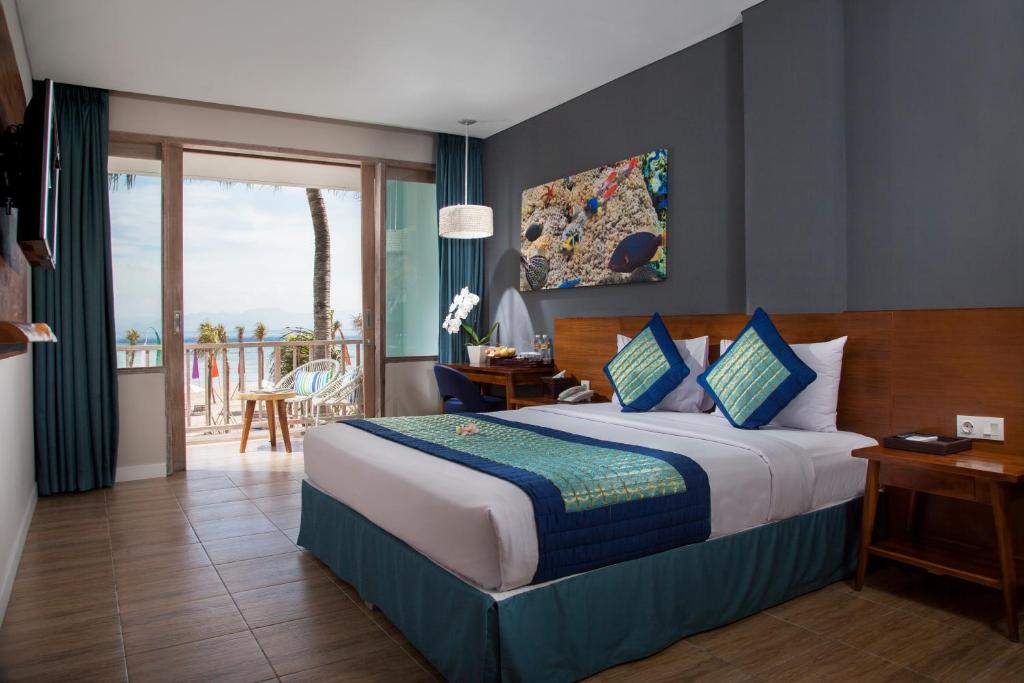 Postel nebo postele na pokoji v ubytování Mahagiri Resort Nusa Lembongan
