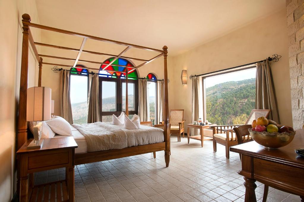 Ένα ή περισσότερα κρεβάτια σε δωμάτιο στο The Orchard at Peora Estates