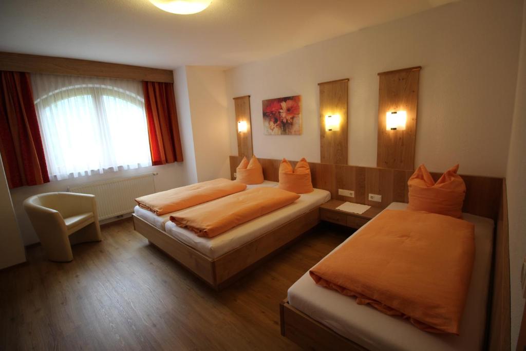 A bed or beds in a room at Haus Peter Schiestl