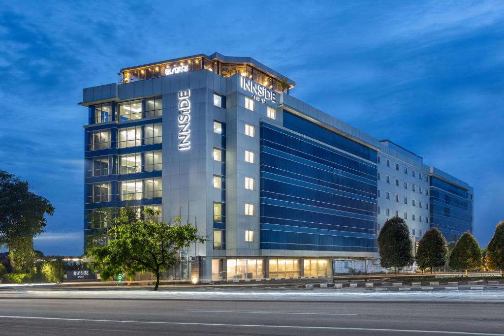an office building with a sign on it at INNSiDE by Meliá Yogyakarta in Yogyakarta