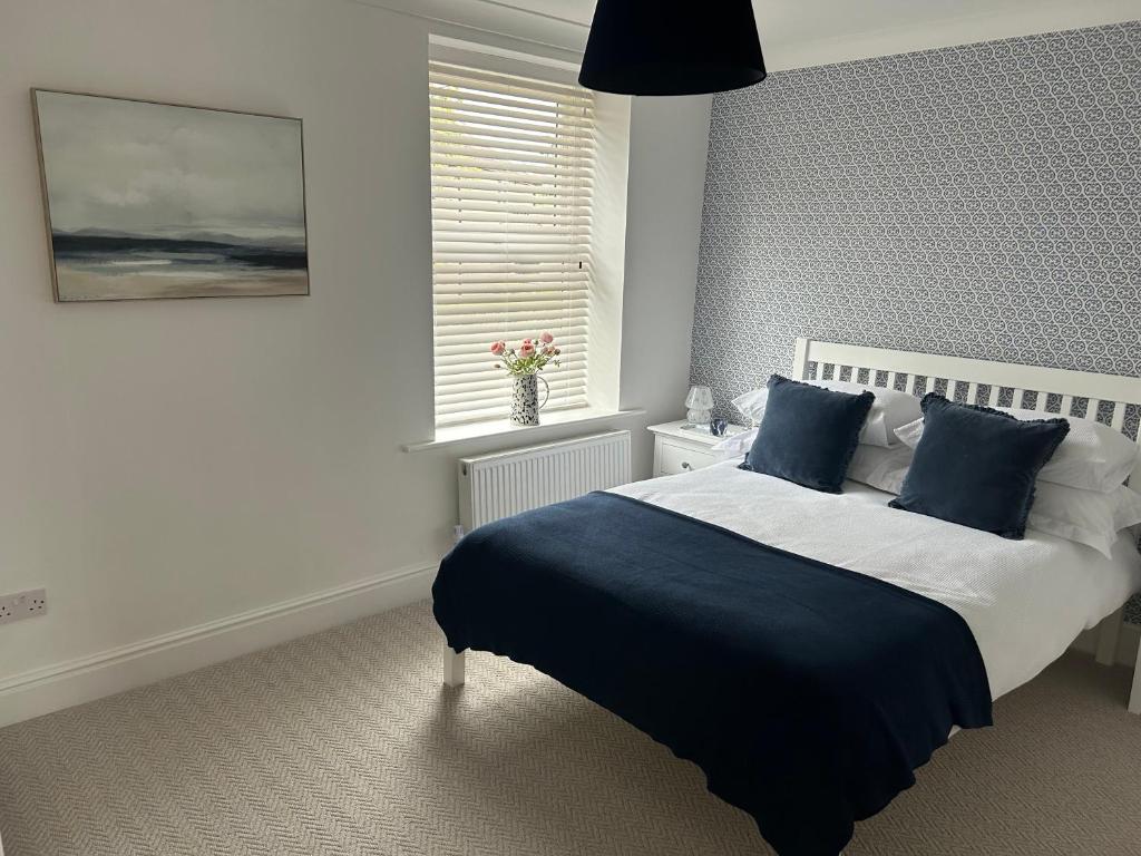 Ένα ή περισσότερα κρεβάτια σε δωμάτιο στο Abbies Place