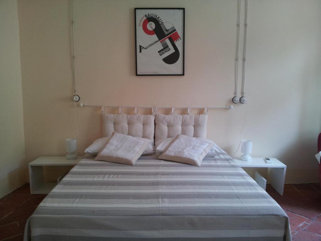 Postel nebo postele na pokoji v ubytování Casa Ternavassi