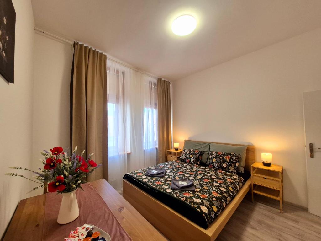 Giường trong phòng chung tại City Center Apartments - Měšťanský dům Minoritská