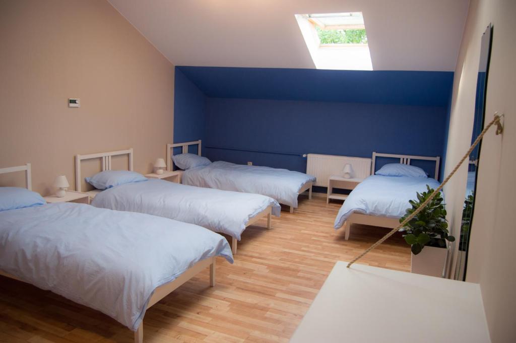 Postel nebo postele na pokoji v ubytování Smart Stay Hostel Gdynia