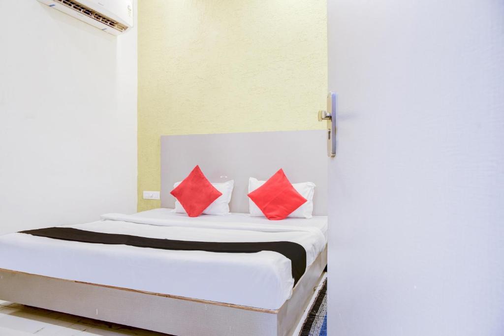 Postel nebo postele na pokoji v ubytování Hotel O Bine Venue