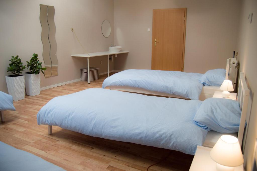 Postel nebo postele na pokoji v ubytování Smart Stay Hostel Gdynia