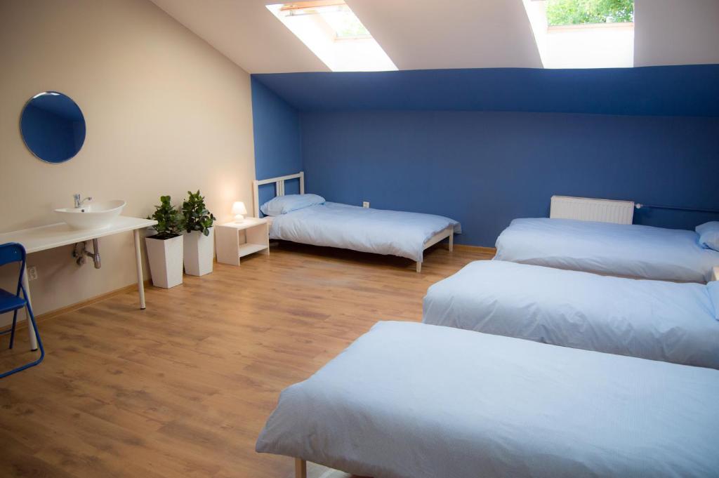 Postel nebo postele na pokoji v ubytování Smart Stay Hostel Gdynia