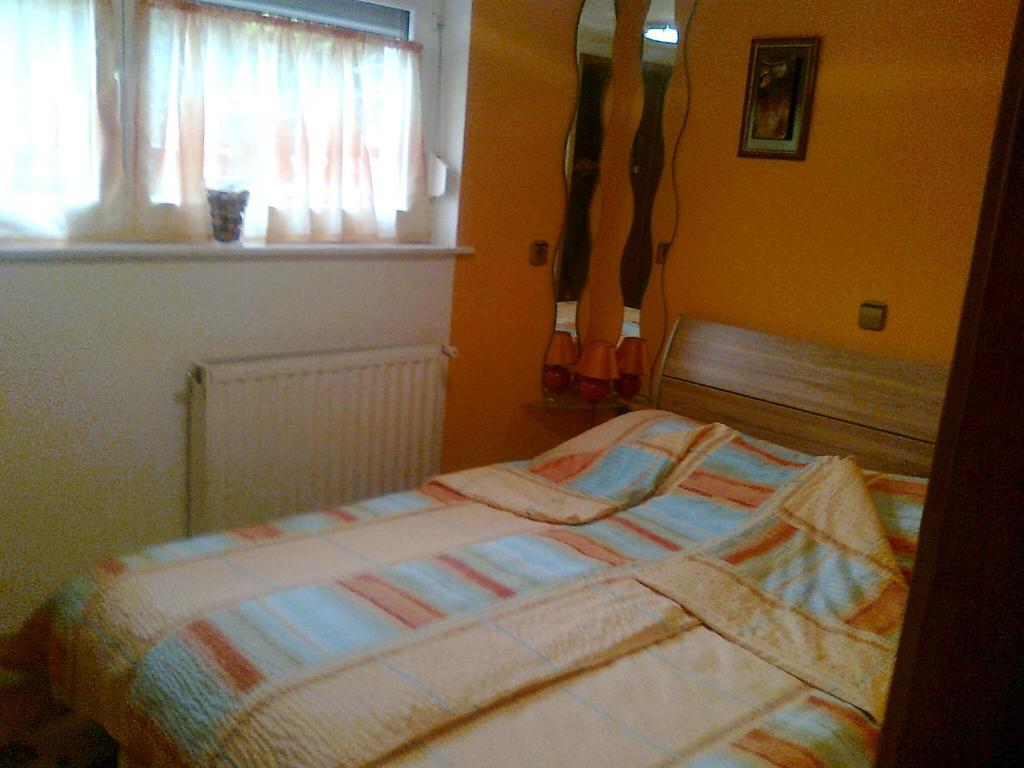Postel nebo postele na pokoji v ubytování Apartma "Pod Matajurjem" mountains view