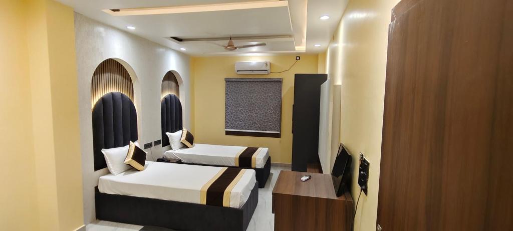 Katil atau katil-katil dalam bilik di Hotel Bodhi Heritage And Restaurant