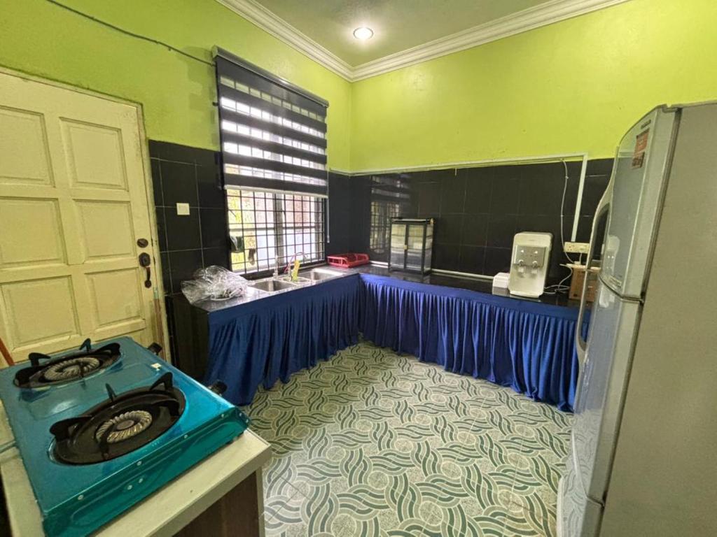 Φωτογραφία από το άλμπουμ του AF Homestay 1 Jalan Guchil Bayam σε Kota Bharu