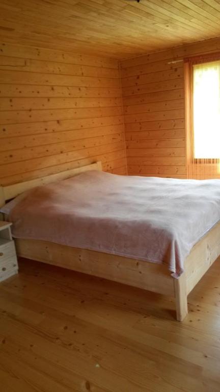 Postel nebo postele na pokoji v ubytování Chalet TysaBorkut