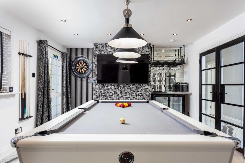 a pool table in a living room with a ceiling at No22 Shalloch House - Donnini Apartments in Ayr