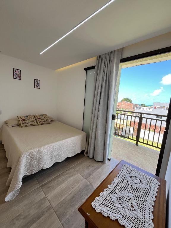 Postel nebo postele na pokoji v ubytování Suite Mar Maragogi