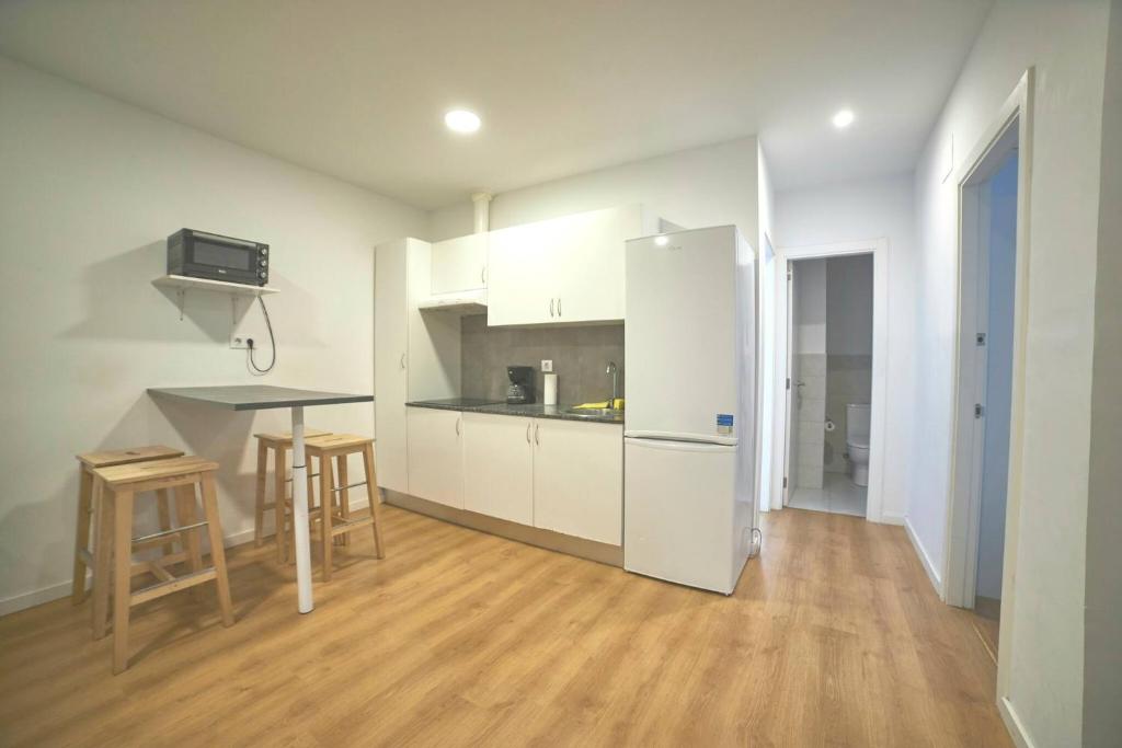 Kuchyň nebo kuchyňský kout v ubytování Apartamentos Lúa Atlántica