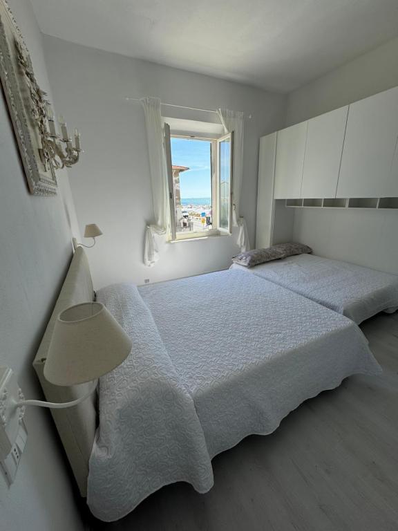 Postel nebo postele na pokoji v ubytování Vista Mare