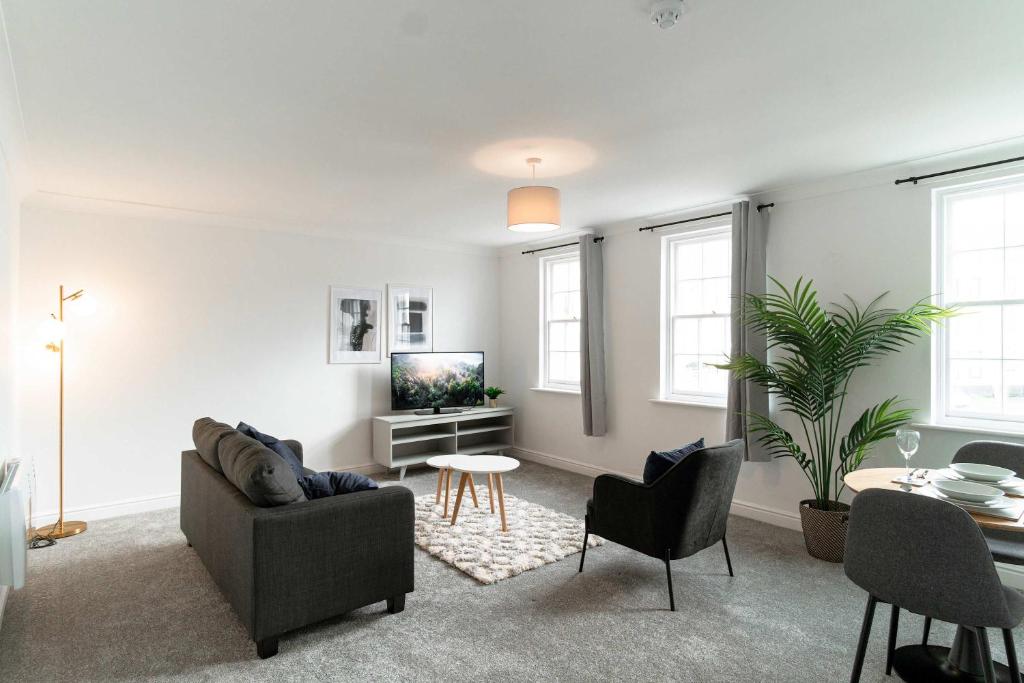 Televiisor ja/või meelelahutuskeskus majutusasutuses Modern 1 Bed Harbour-side Apartment in Whitehaven