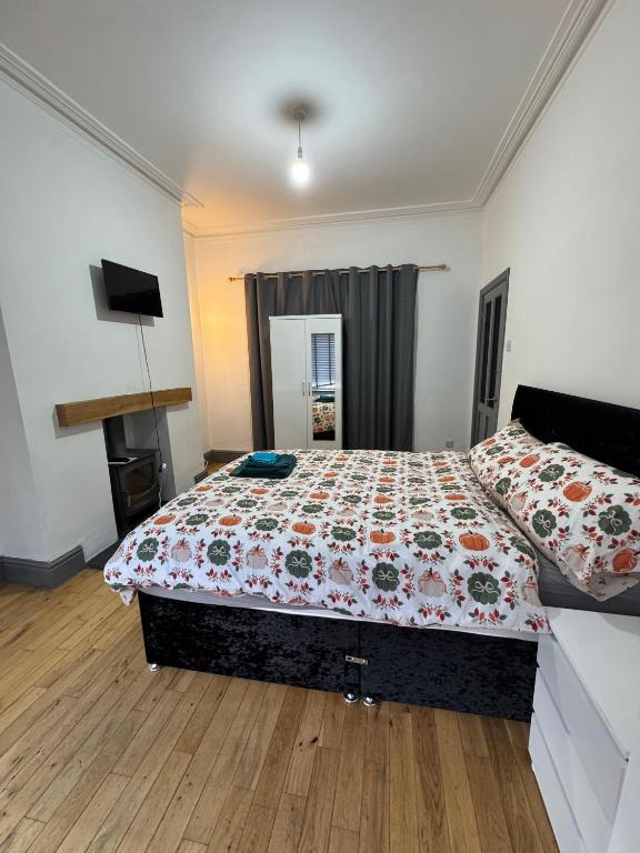 Ένα ή περισσότερα κρεβάτια σε δωμάτιο στο Comfort and Leisure