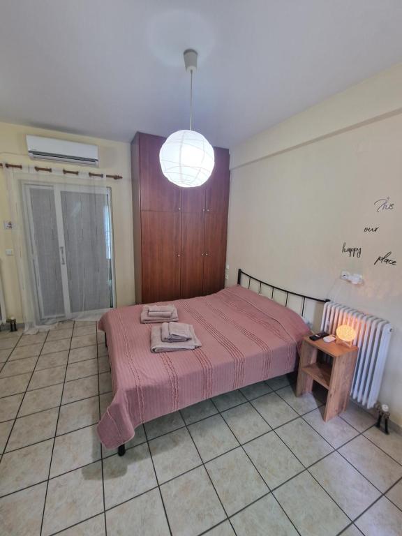 Postel nebo postele na pokoji v ubytování Diana's Cozy 1 Studio