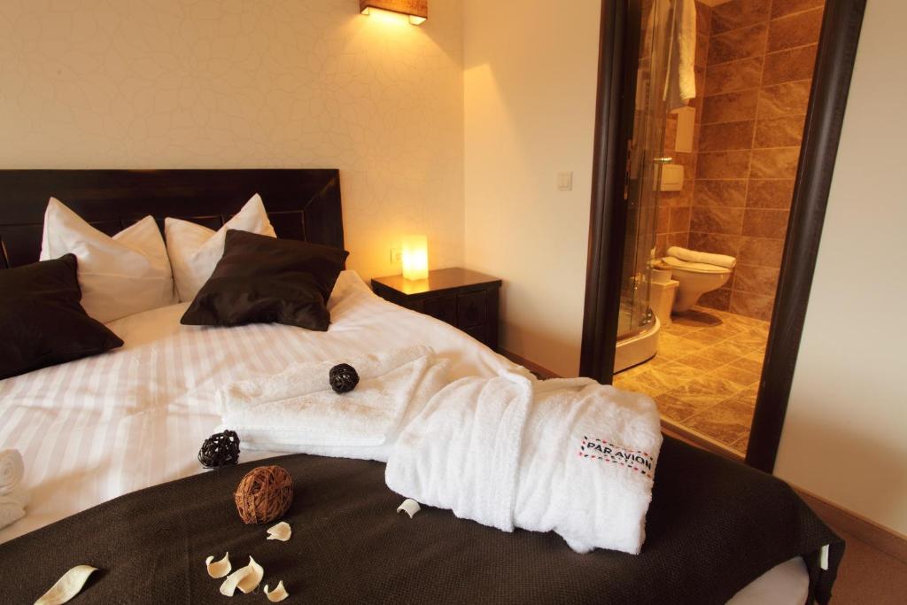 Postel nebo postele na pokoji v ubytování Hotel Par Avion