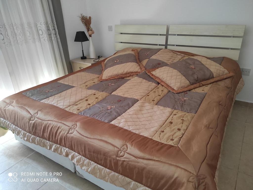 Postel nebo postele na pokoji v ubytování Tatlısu North Cyprus Sea Terra Bay