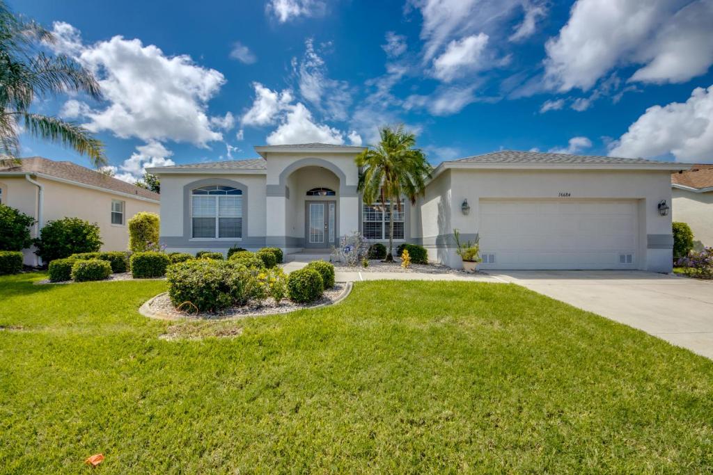 a large house with a driveway at 16684 Wellington in Biggar