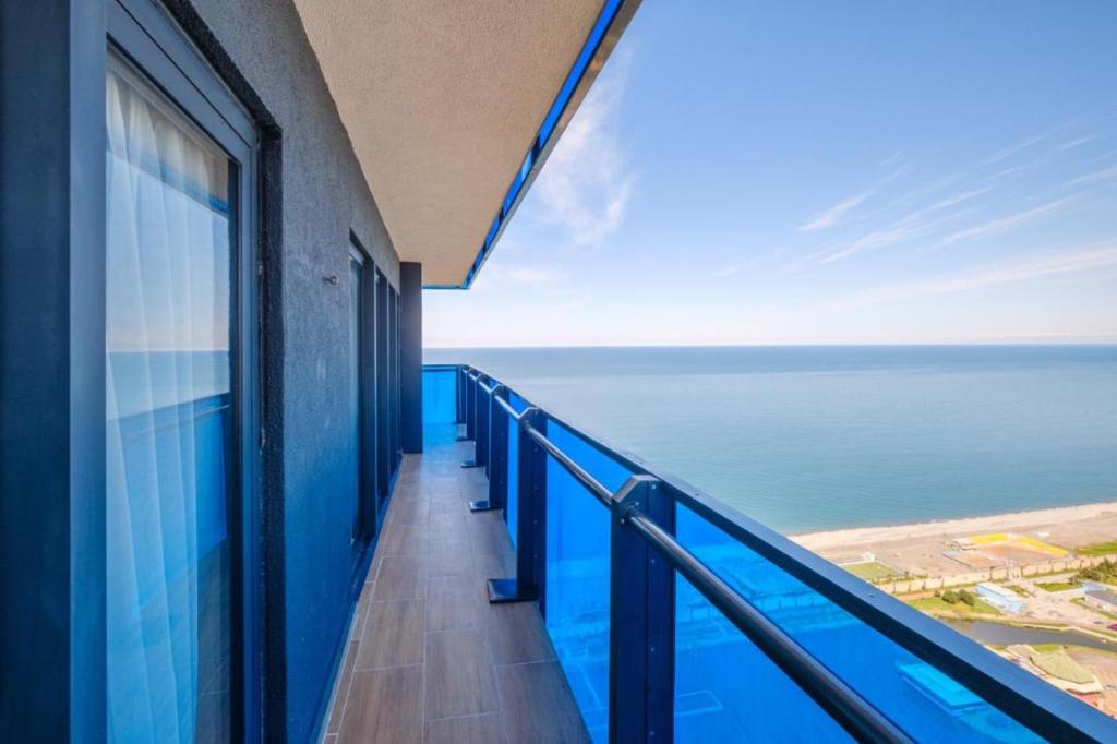 a balcony with a view of the ocean at Nice Sea View Aparthotel In Orbi City Batumi in Batumi