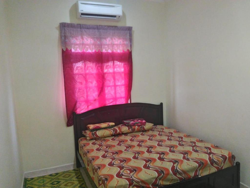 Postel nebo postele na pokoji v ubytování Z&R HOMESTAY