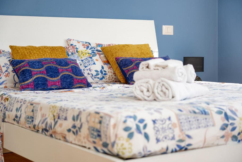 En eller flere senge i et værelse på Casa IDA