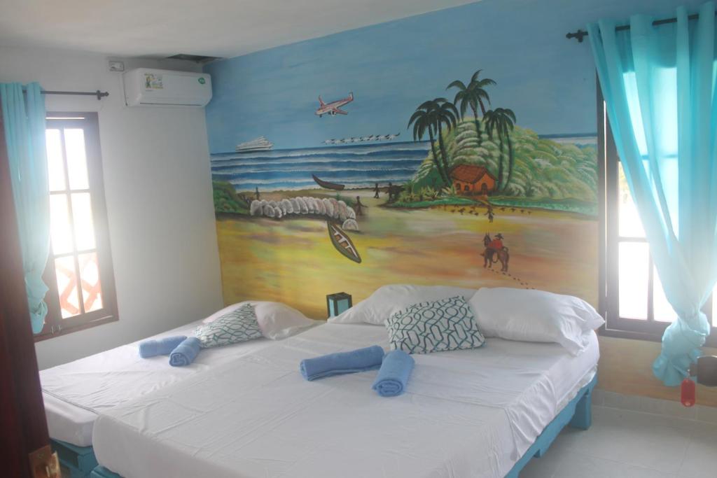 Postel nebo postele na pokoji v ubytování Blue Ocean Village