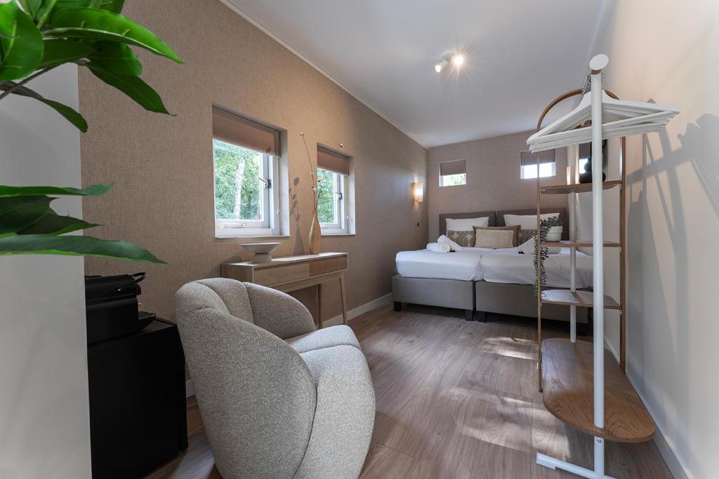 En eller flere senge i et værelse på Budget Room Near University Tilburg with Wifi