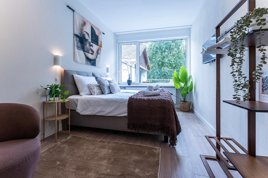 En eller flere senge i et værelse på Nature Budget Room Near Tilburg University