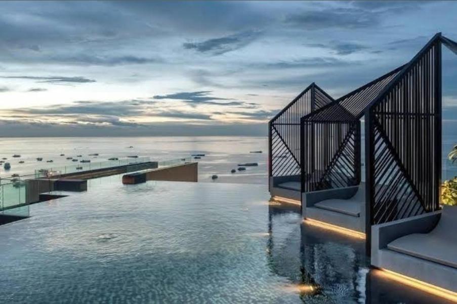 a view of a pool on top of a building at The Edge Central Pattaya Tops Luxury New Project in Ban Nong Chaeng