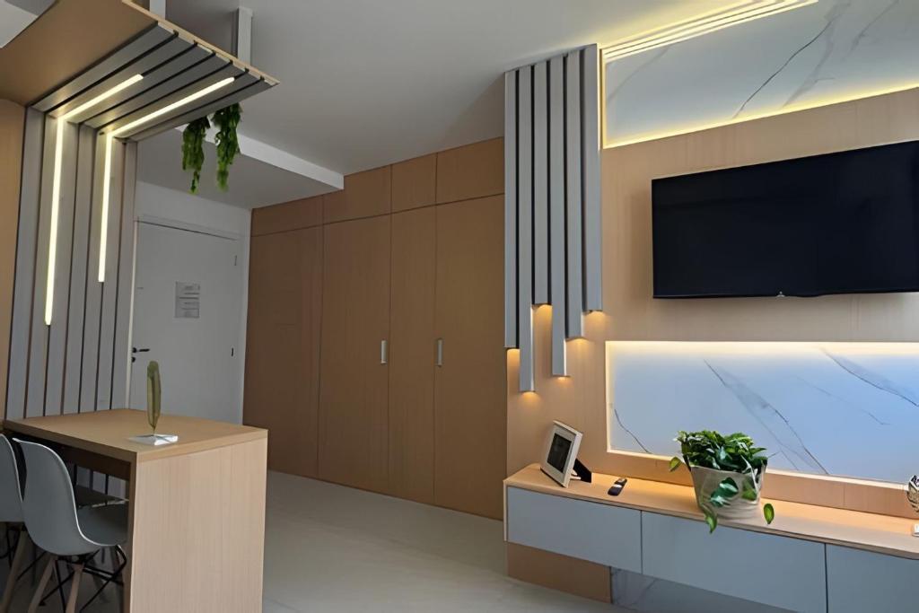 Televisyen dan/atau pusat hiburan di Residencial Vivant - Perto de TUDO! LZN Hospedagens