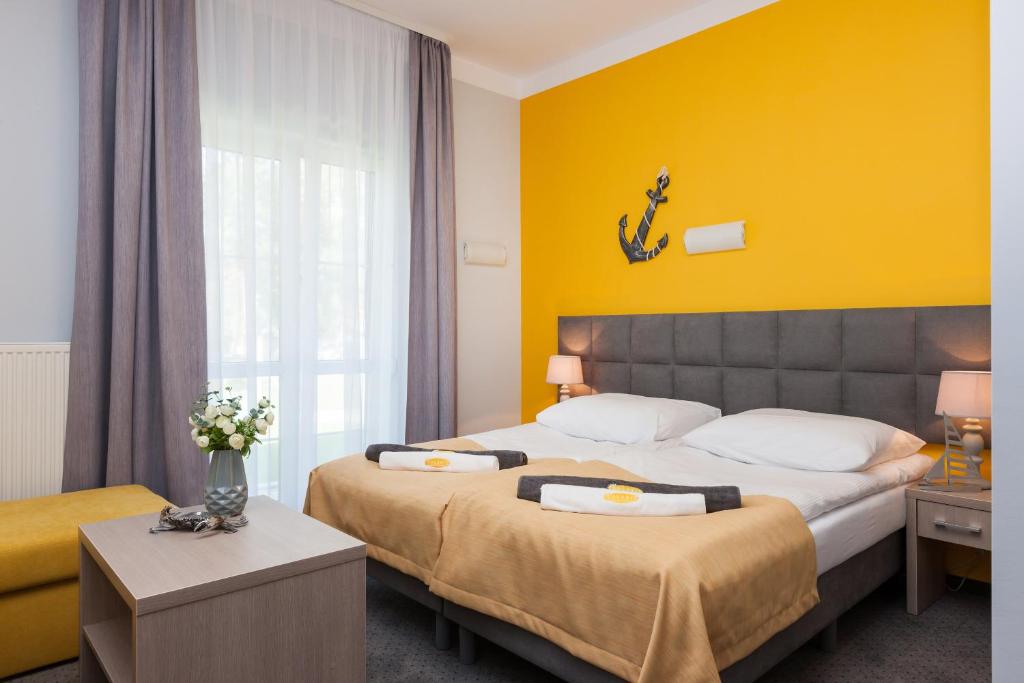 Postel nebo postele na pokoji v ubytování Solaris