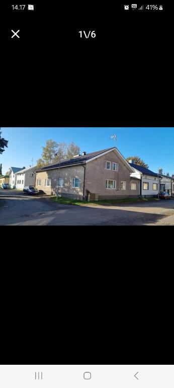 a picture of a building and a street at Sackle's place in Pori