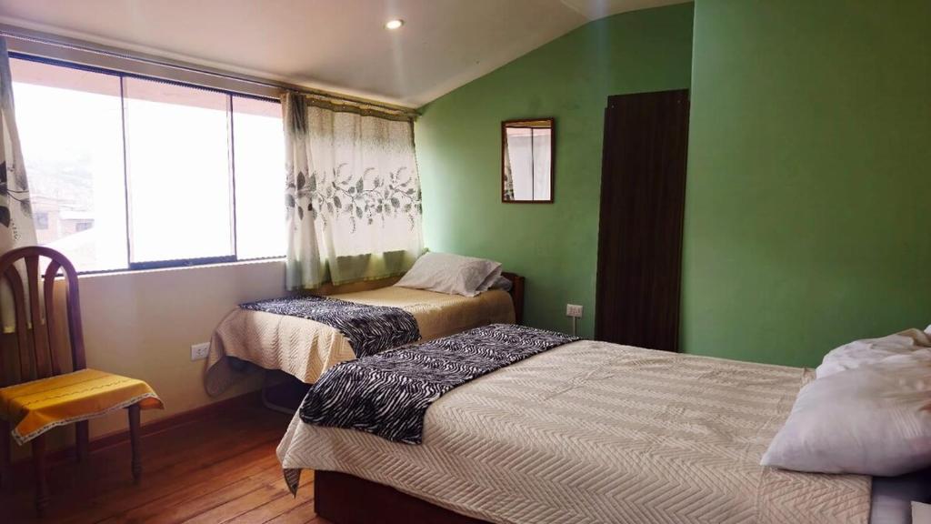 Katil atau katil-katil dalam bilik di Cozy Mini-Apartment-Cusco