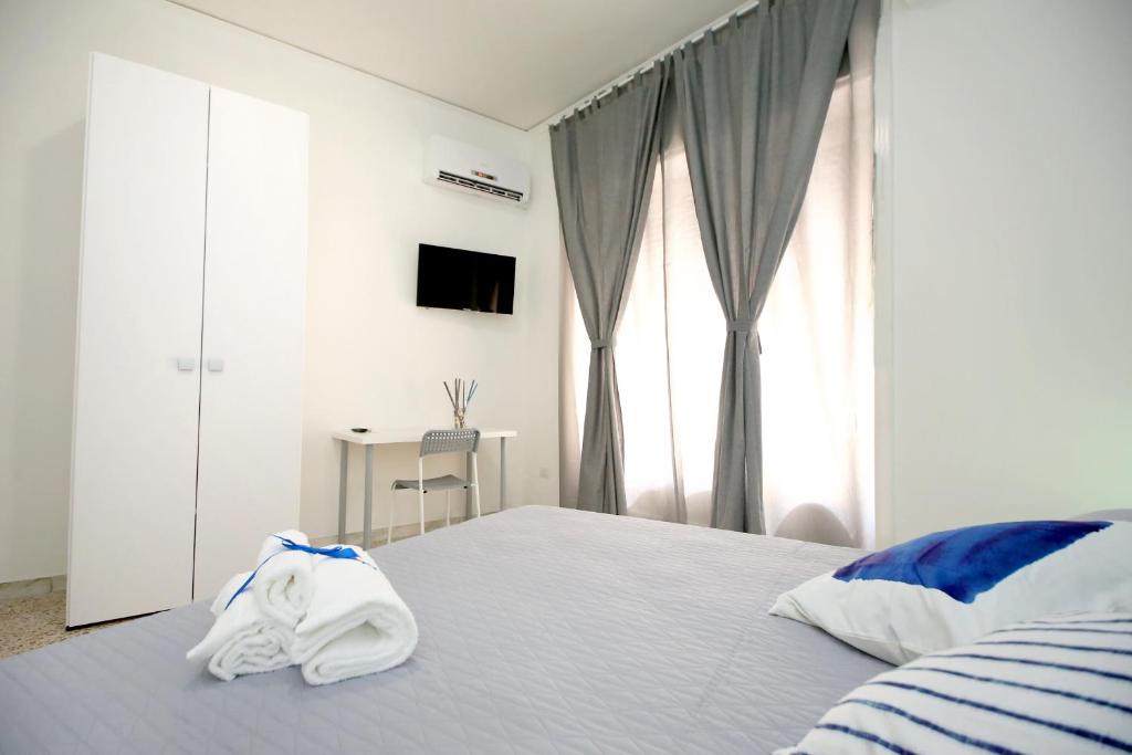 Posteľ alebo postele v izbe v ubytovaní B&B Salernoway