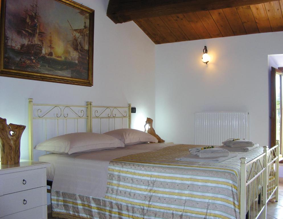 Posteľ alebo postele v izbe v ubytovaní B&B TorreMatta