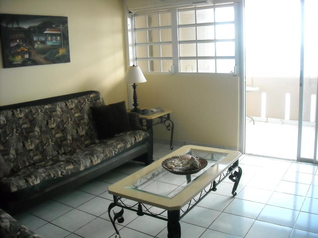 Zona de estar de Ocean Front Apartment